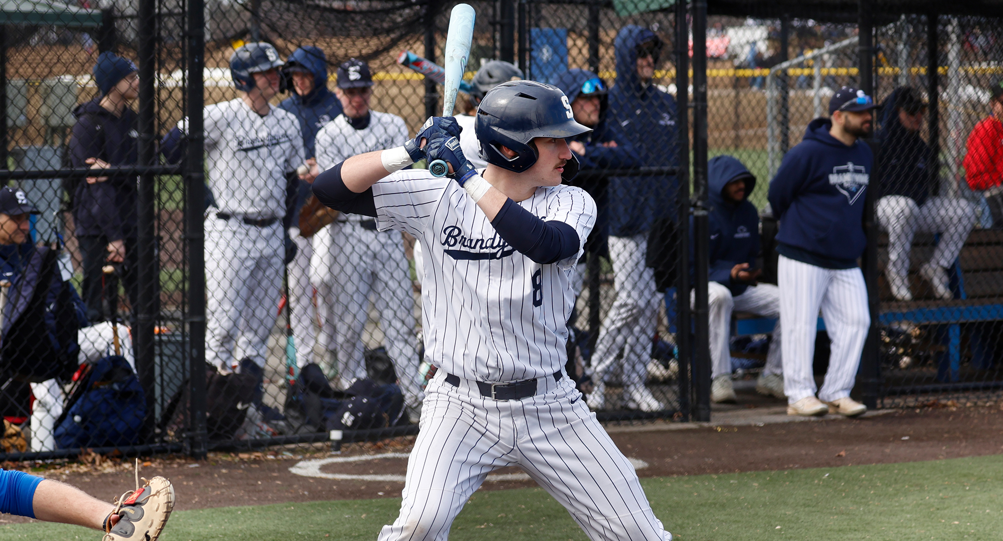 Baseball player readies to hit at the plate