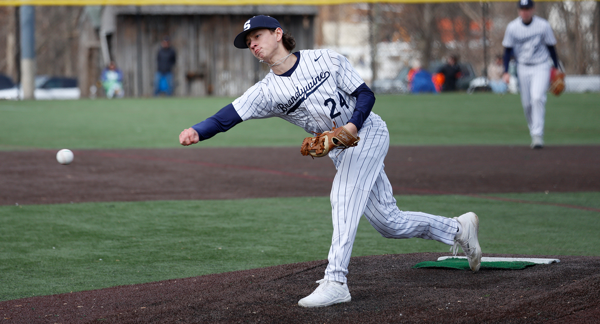 baseball pitcher throwing ball