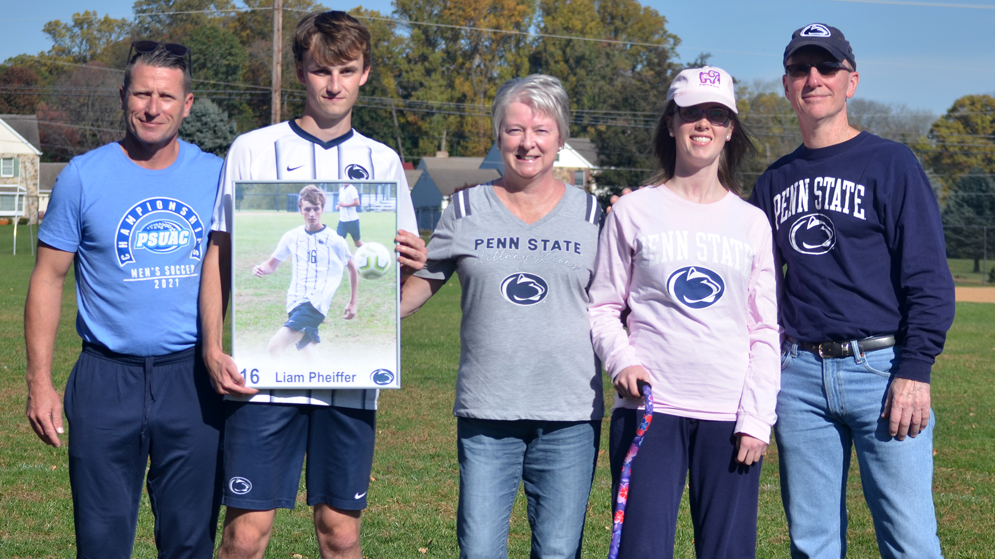 Brandywine senior Liam Pheiffer with head coach Tom Greenawalt and family