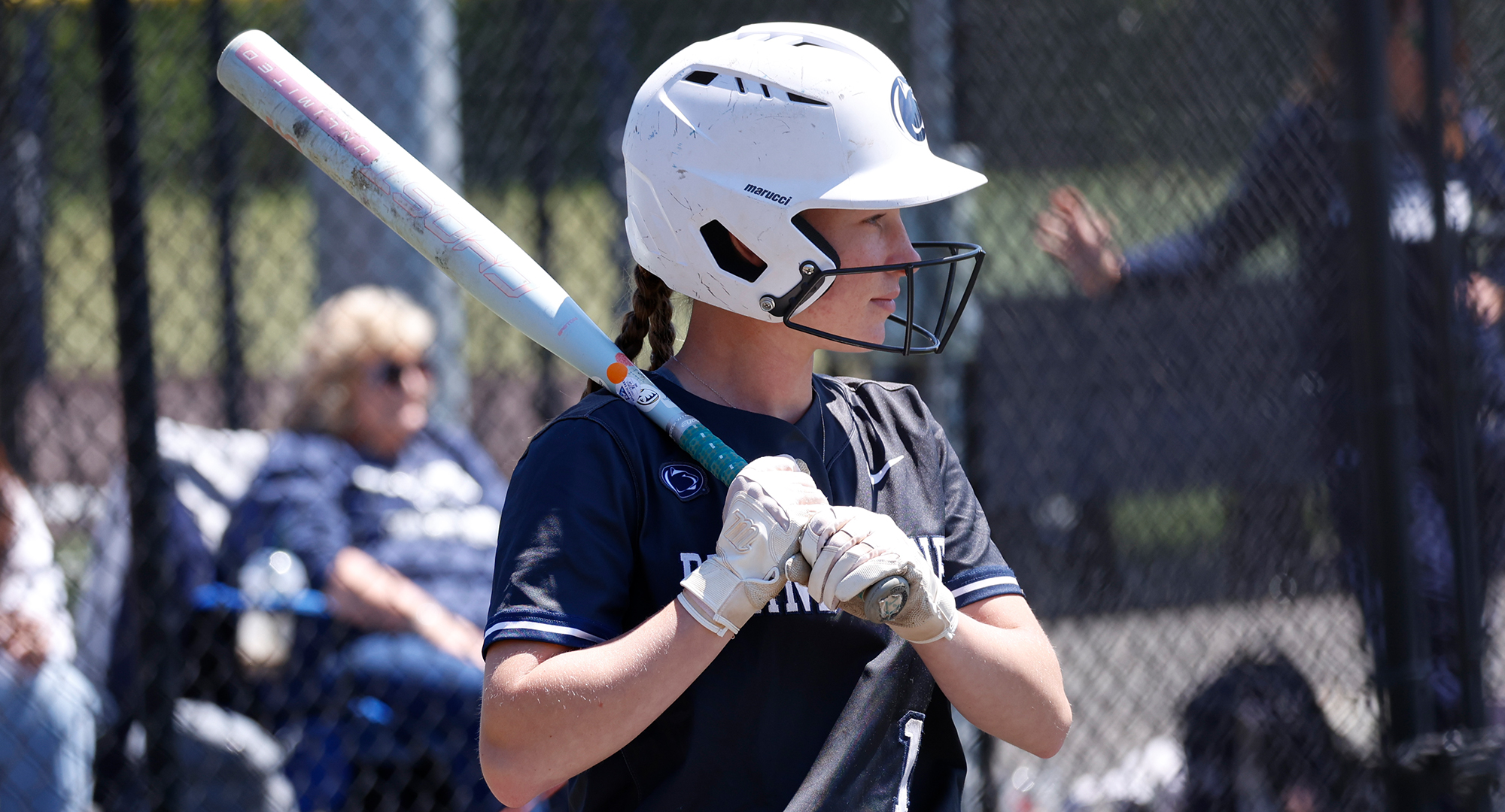 softball player stares down pitcher