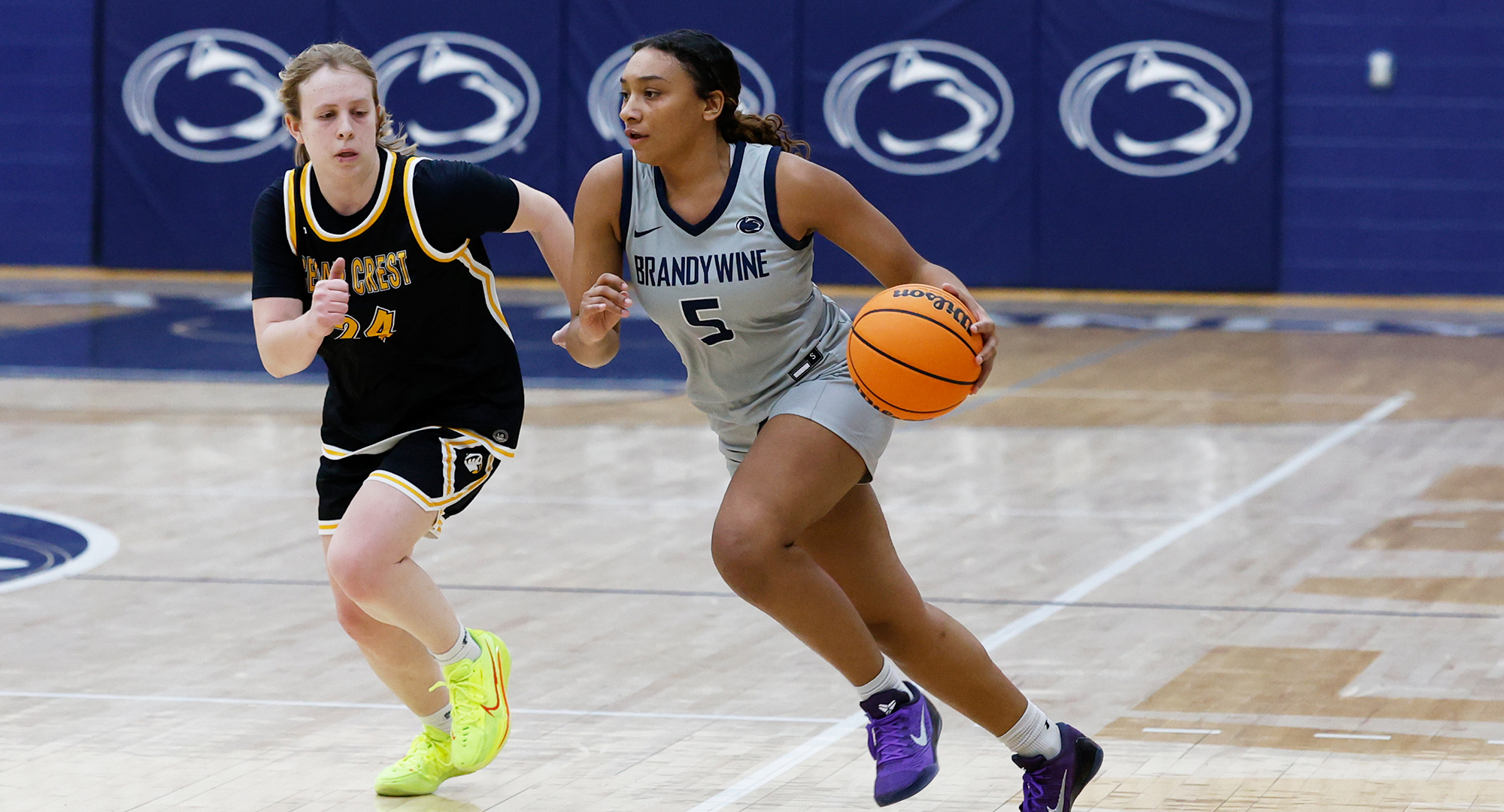 women's basketball player with basketball
