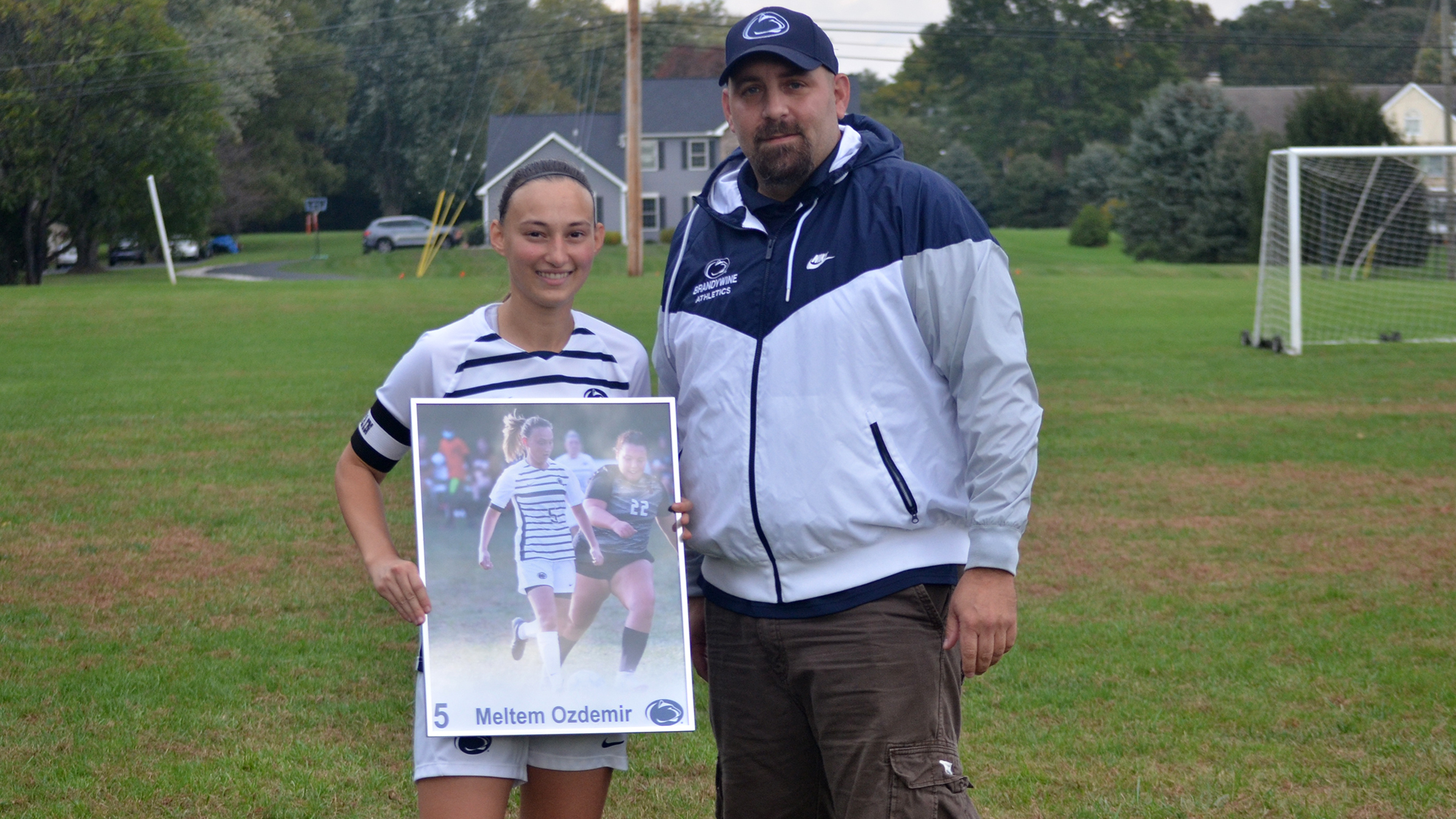 Meltem Ozdemir and Head Coach John DiCriscio