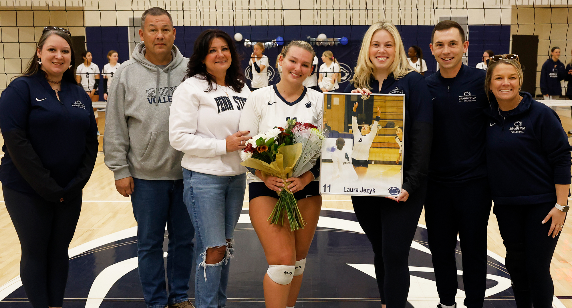 Senior Laura Jezyk with family and coaches
